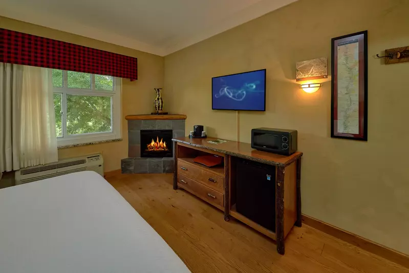 king guest room with fireplace