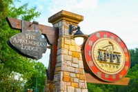 The Appy Lodge sign sunset